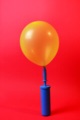 balloons and pump for inflating balloons