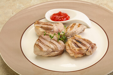 Grilled pork tenderlion with tomato sauce
