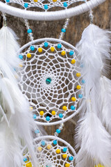 Handmade dream catcher with feathers threads and beads rope hanging