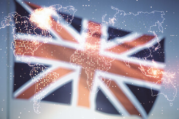 Abstract creative digital world map on British flag and sunset sky background, globalization concept. Multiexposure