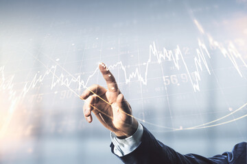 Multi exposure of man hand with pen working with abstract virtual financial graph on blurred office...