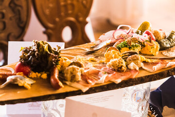 table of various bavarian sausages on wooden board