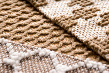 Close up shot of weaving tapestry. Brown and beige color palette.