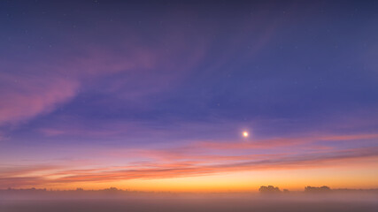 Fabulous colorful autumn morning in the fog.