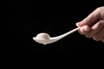 Close up of glue pudding or tangyuan . Chinese Lantern Festival food.
