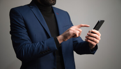 business man holding smart phone