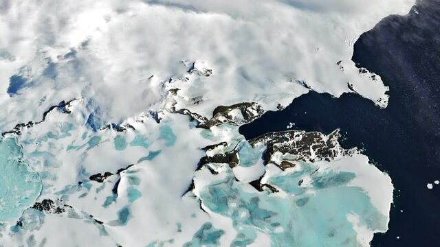 The Antarctic peninsula viewed from space from a satellite. Contains public domain image by NASA.