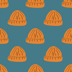 Contoured orange beanie hat seamless pattern. Hipster clothes ornament on blue pale background.