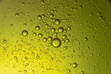 macro oil water photography Abstract background and texture of bubbles light multi color illumination.  art water surface for your products display and artwork design with copy space. Watery glare 