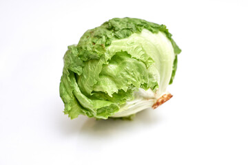 swing of fresh iceberg lettuce on white background