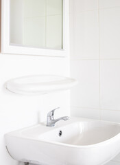 White sink in the bathroom.