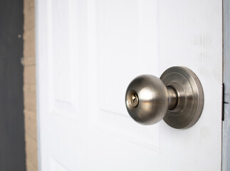 Open the door. Door with chrome metal handle