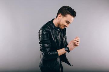 Portrait of a young man wearing a leather jacket