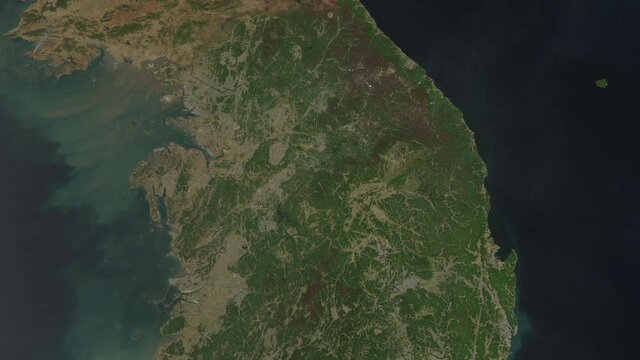 South and North Korea countries view from space from a satellite. Contains public domain image by NASA.