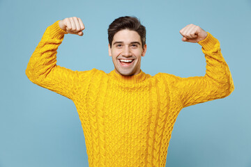 Young caucasian happy unshaved strong sporty fitness man 20s wear casual knitted cozy yellow...