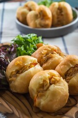 Bandung, Indonesia - January 24 2021 :  Chicken minced meat sandwich with salad toping