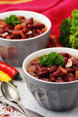 Two bowls with traditional Georgian dish - lobio