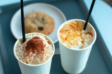 Ice tea with caramel sauce and milk 