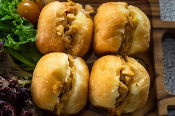 Bandung, Indonesia - January 24 2021 :  Chicken minced meat sandwich with salad toping