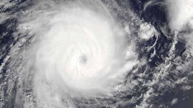 A tropical cyclone view from space from a satellite. Contains public domain image by NASA.