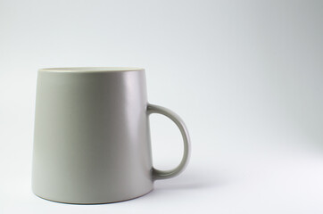 Coffee mug cup with light and shadow modern style on single position and presentation white background, empty tea cup isolated wallpaper.