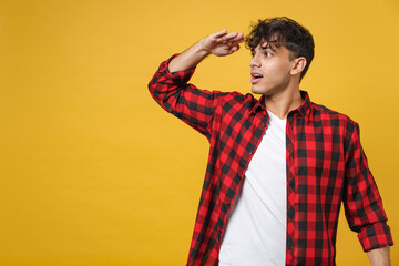 Young spanish latinos handsome dreamful stylish attractive man 20s wearing red checkered shirt...