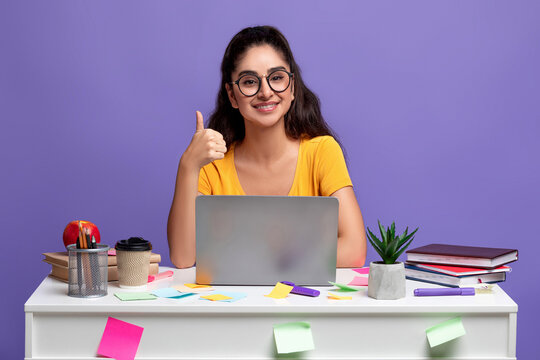 Indian Woman Using Laptop Showing Thumbs Up Gesture