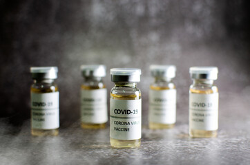 Coronavirus vaccine bottle isolated on white smoke background. Covid-19 situation disease pharmacy...