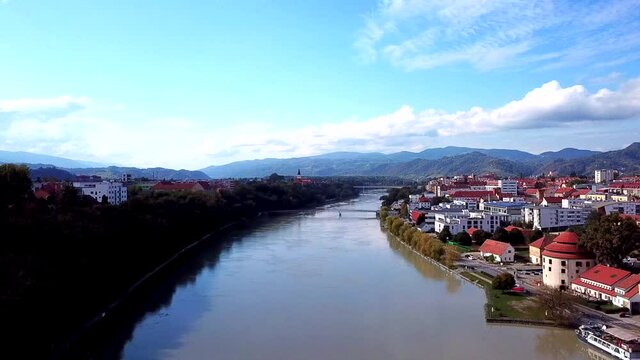 Descending drone shot above Drava River at Maribor, Slovenia