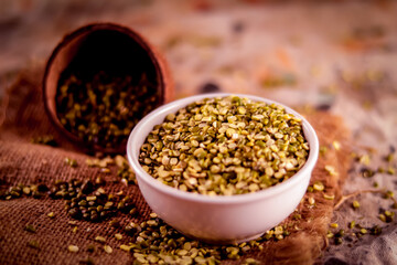Mung beans and green mung dal on moong heap with white bowl, Mung dal and green raw moong bean