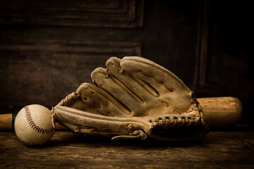 Vintage baseball gloves and ball
