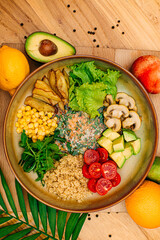 Healthy eating. Salad with mushrooms, lettuce, tomatoes and zucchini on a decorated table