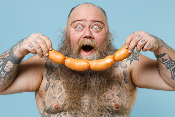 Shocked worried fat pudge obese chubby overweight man has tattooed naked bare big belly hold...