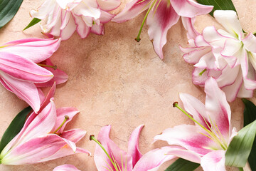 Frame made of beautiful lilies on color background