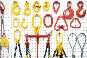 Hooks, blocks, metal cables and chains in store