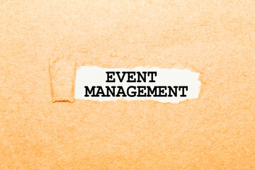 text EVENT MANAGEMENT on a torn piece of paper, business concept