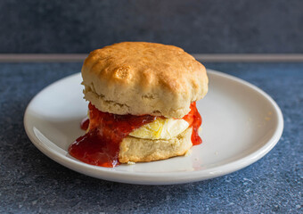 Scone with Clotted cream and strawberry jam