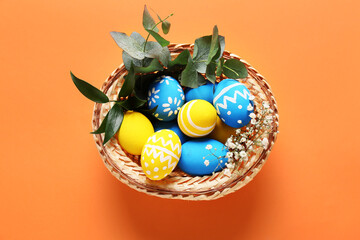 Beautiful Easter eggs on color background