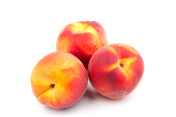 Summer fruit background. Ripe juicy peaches on white background. Copy space. Fresh organic fruit vegan food. Harvest concept