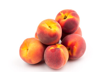 Summer fruit background. Ripe juicy peaches on white background. Copy space. Fresh organic fruit vegan food. Harvest concept