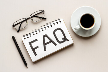FAQ - fequently asked question - on table ofiice table. Top view