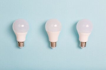 energy saving light bulbs on blue background. LED bulbs. Energy saver. Eco friendly....