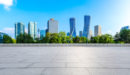 Empty square floor and modern city skyline with building in Hangzhou,China.