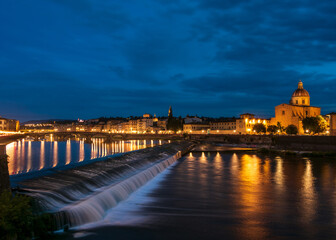 the river Arno at the pescaia of Santa Rosa at dusk