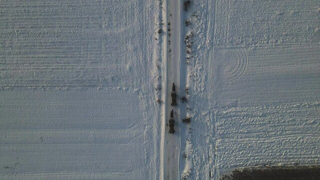 Winter Shot of peasants and their carts