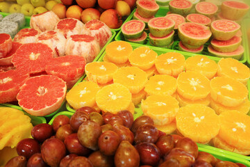 Cross sectional close-up of oranges and oranges