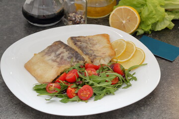fried congrio fish with vegetables for lunch