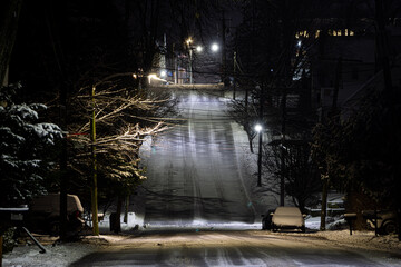 Street Freshly Snow Plowed At Night