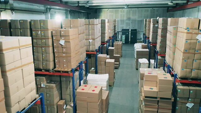 Large warehouse full of cardboard boxes