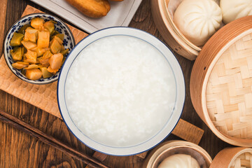 Fototapeta na wymiar Chinese porridge breakfast set, fried dough sticks, white porridge,